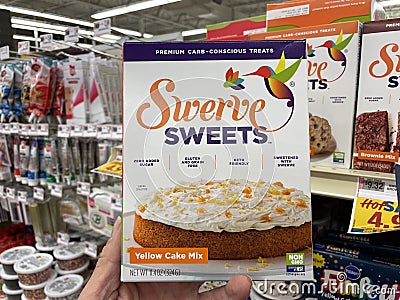 Hand holding Swerve Sweets yellow cake mix Editorial Stock Photo