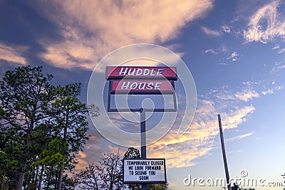 Huddle House restaurant closed street sign Editorial Stock Photo