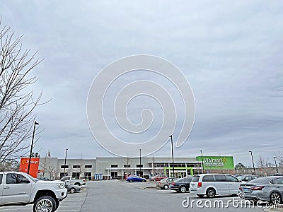 Walmart Neighborhood supermarket grocery retail store and parking lot Editorial Stock Photo