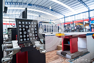 Auomobile repair, Vehicle suspension alignment sensor and set up car wheel alignment at a car repair center that meets Stock Photo