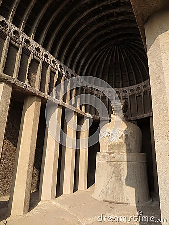 Aurangabad Cave 4, a square chaitya hall with vaulted stone ribs + stupa with round base, topped with a harmika platform Editorial Stock Photo