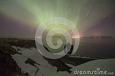 Aurora borealis above Hvitserkur rock is a spectacular rock in t Stock Photo