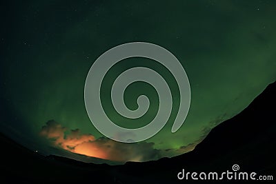 Aurora Borealis against the sunset sky in Iceland Stock Photo