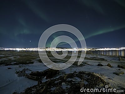 Aurora borealis at night in tromsoe city Stock Photo