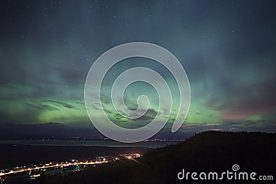 Aurora Borealis over alaskan towns Stock Photo