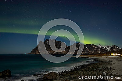 Aurora borealis over Uttakleiv beach, Lofted Norway Stock Photo