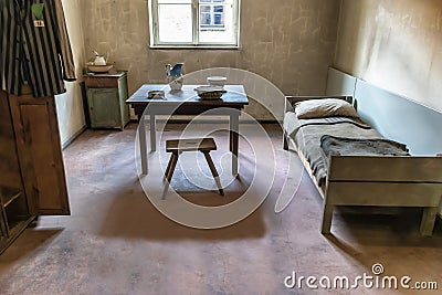 Auschwitz, Poland - June 2, 2018: Bedroom of a kapo or prisoner functionary. Was a prisoner in a Nazi concentration camp who was Editorial Stock Photo