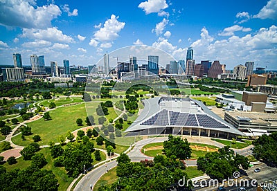 Austin Texas Powered by Solar Panels on Rooftop of Large building Downtown Skyline Cityscape Stock Photo