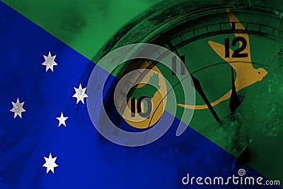 Australia, Australian, Christmas Island flag with clock close to midnight in the background. Happy New Year concept Stock Photo