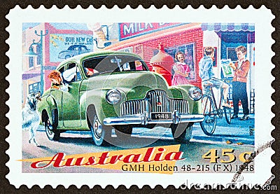 AUSTRALIA - CIRCA 1997: A stamp printed in Australia shows GMH Holden 48-215 FX sedan, 1948, circa 1997. Editorial Stock Photo