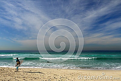 Australia: Tamarama beach woman surfer looking Editorial Stock Photo