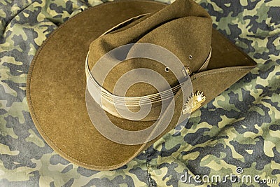 Australian army diggers slouch hat on a camouflage background. Stock Photo