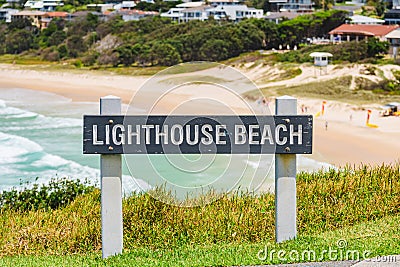 Australian coast, Lighthouse Beach information board with the name of the beach at the entrance to the sandy beach Stock Photo