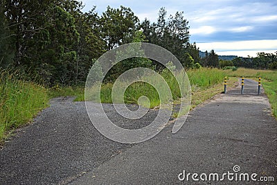 Forked road landscape with high and low choices Stock Photo