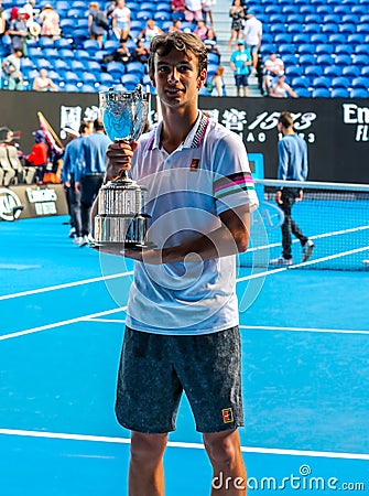 2019 Australian Open champion Lorenzo Musetti of Italy during trophy presentation after his Boys` Singles final match in Melbourne Editorial Stock Photo