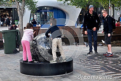 Australian people children playing stone circle at Patio outdoor Editorial Stock Photo