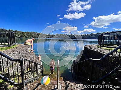 Australian people swim in Lake Eacham Queensland Australia Editorial Stock Photo