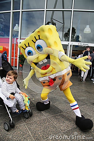 Australian tennis fans taken pictures with SpongeBob SquarePants during Australian Open 2016 at Australian tennis center Editorial Stock Photo