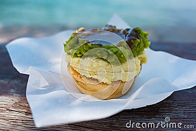 Australian traditional meat pie with Woolloomooloo bay on the ba Stock Photo