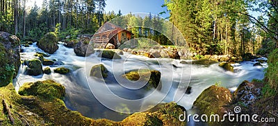 Austria panorama landscape with waterfall and watermill near Sal Stock Photo