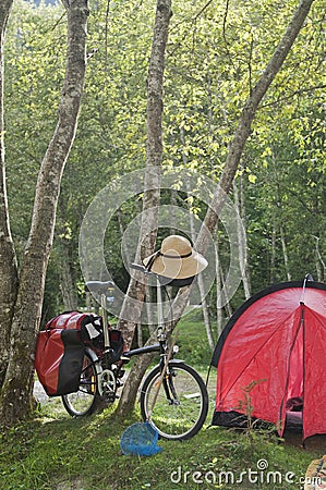 Austria, Salzburger Land, Bike next to tent Stock Photo