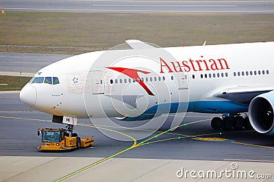 Austrian Airlines plane being towed Editorial Stock Photo