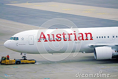 Austrian Airlines plane being towed Editorial Stock Photo