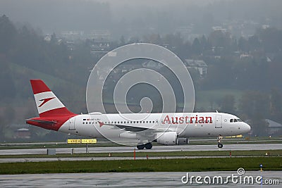 Austrian Airlines plane doing taxi on taxiway in Zurich Airport, ZRH Editorial Stock Photo