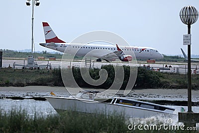 Austrian Airlines plane taxiing on Venice Marco Polo Airport, VCE Editorial Stock Photo