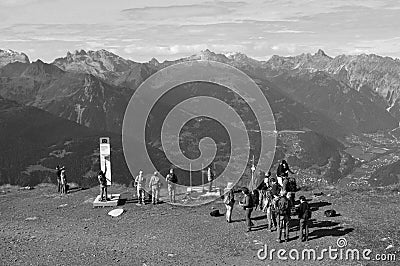 Austrian alps: Hikers on top of MOunt Hochfirst above Schruns in Montafon valley Editorial Stock Photo