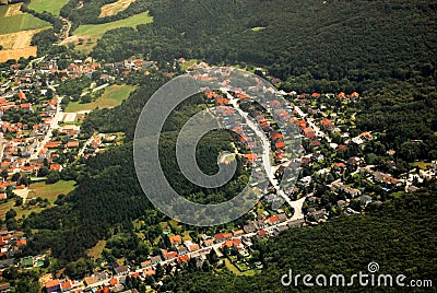 Austrian village and forest seen from a plane Stock Photo