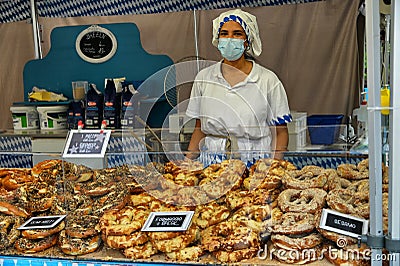 Authentic german handmade bretzel bakery at street food fair Editorial Stock Photo