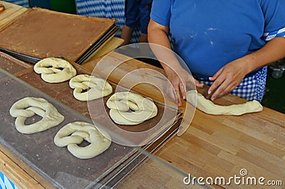 Authentic german handmade bretzel bakery at street food fair Stock Photo