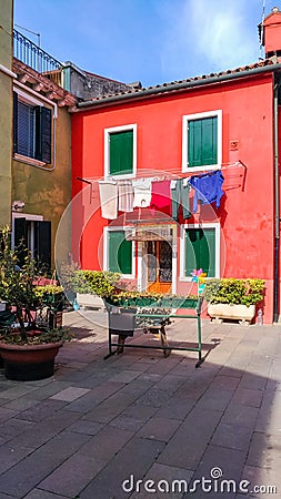 Authentic house and Colourful washing hanging in the backstreets of Venice Stock Photo
