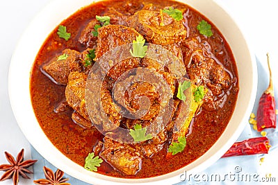 Authentic Lamb Vindaloo Traditional Fiery Red Indian / Goan Curry of Lamb. Stock Photo