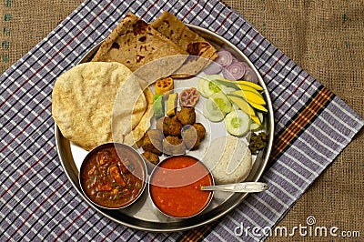 Authentic Maharashtrian lunch thali with Amras and poli, India. Stock Photo