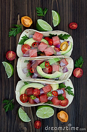 Authentic mexican grilled fish tacos with watermelon Pico de Gallo. Stock Photo