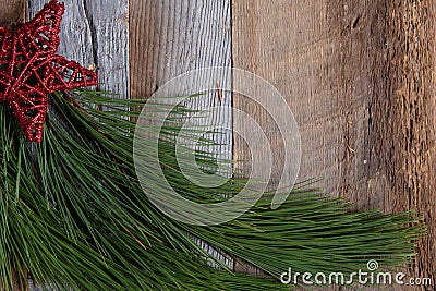 Authentic and rustic Christmas holiday decorations on weathered wood Stock Photo