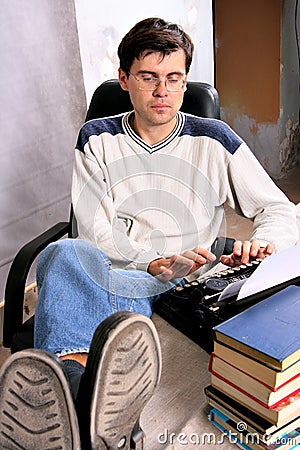 Author typing a bestseller Stock Photo