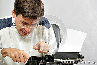 Author typing his bestseller Stock Photo