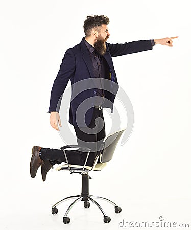 Authority concept Angry boss gives orders and shows his authority. Stock Photo