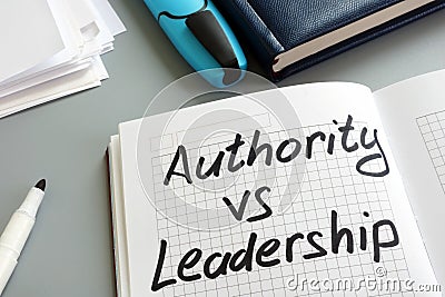 Authority vs Leadership sign in the note. Types of management Stock Photo