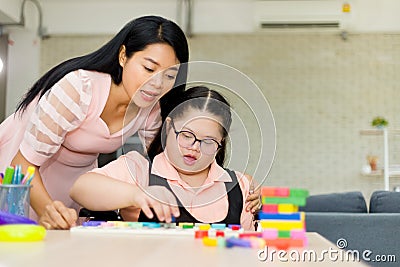 Autism girl with learning practice at home Stock Photo
