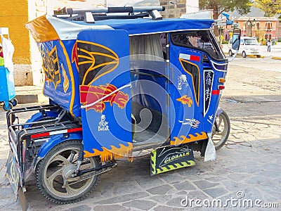 Auto rickshaw parked in the street of Chivay town, Peru Editorial Stock Photo