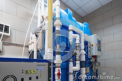 Automated computerized ozone generator machine for ozonation of pure clean drinking water in water production factory Stock Photo