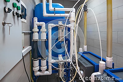 Automated computerized ozone generator machine for ozonation of pure clean drinking water in water production factory Stock Photo