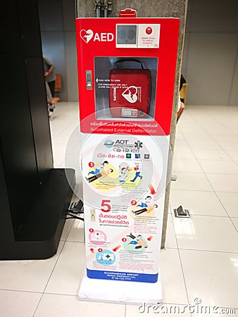 Automated External Defibrillator AED machine at Gate door in Thailand international airport for help patients have a Emergency C Editorial Stock Photo