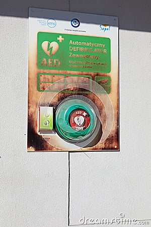 Automated External Defibrillator, AED, on the side of a building in Sopot, Poland Editorial Stock Photo