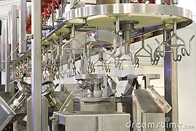 Automated line for cutting and portioning poultry carcasses Stock Photo