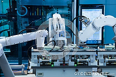 Automated robotic assembly electronic circuit board, Smart factory 4.0 concept Stock Photo